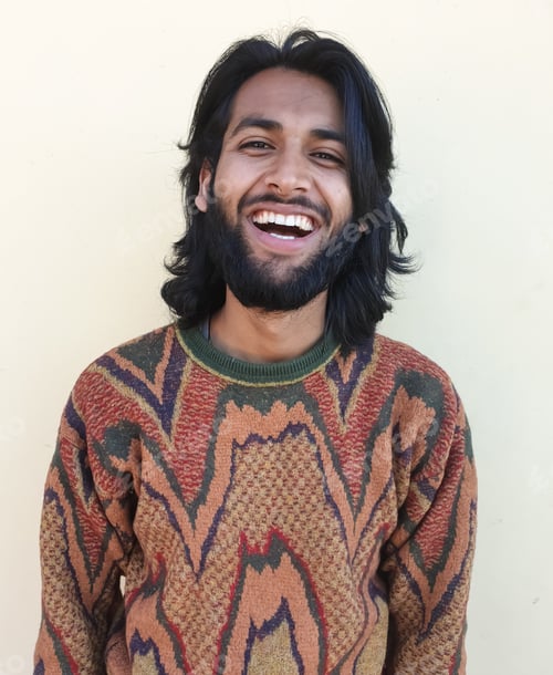 Preview: A south asian handsome man smiling with looking at camera