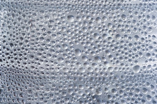 Preview: Condensation drops dew on bottle