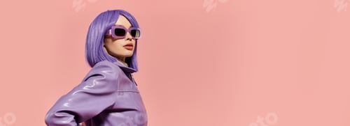 Preview: Vibrant stylish woman in purple attire posing confidently against a pink background