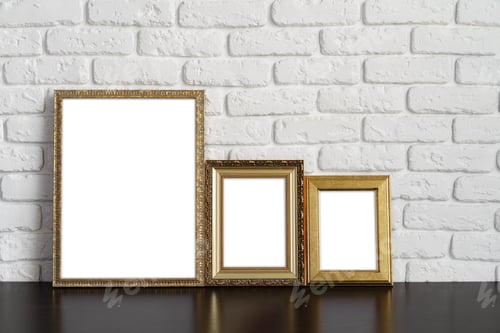 Preview: Blank picture frame against brick wall with copy space