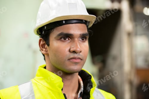 Preview: industrial factory worker working in metal manufacturing industry