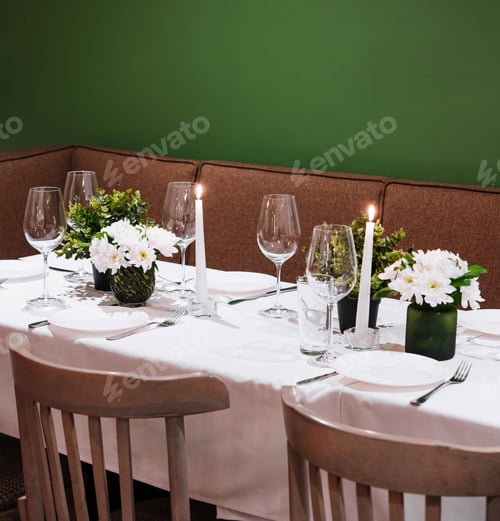 Preview: Elegant dining table setting with candlelight