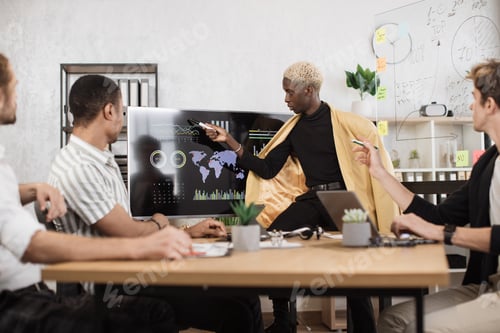 Preview: Multiethnic male brokers spending time at office for making strategy of successful business project.