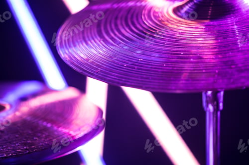 Preview: drum cymbal close-up, on a background of colored lanterns.