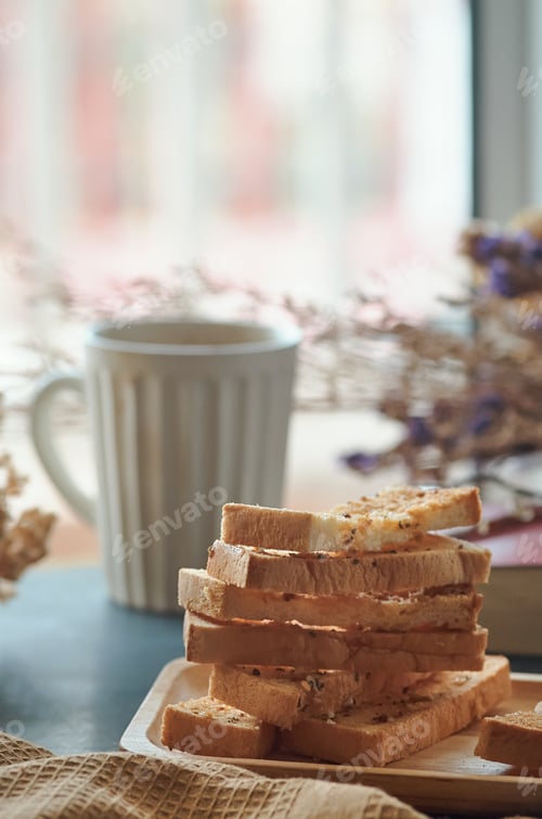 Preview: Garlic breadsticks in a wooden tray