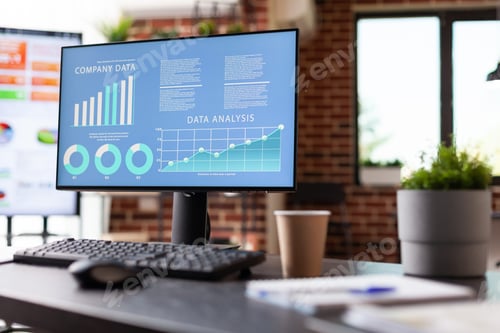 Preview: Monitor with charts with annual data analysis on screen