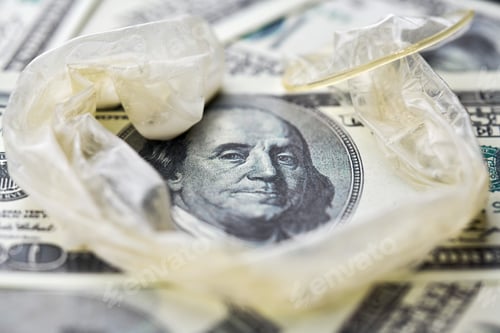 Preview: Used condom with cum and US dollars bills