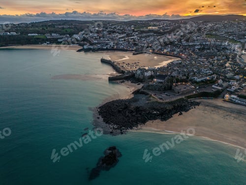 Preview: Aerial view of St Ives, Cornwall against the sea at sunset