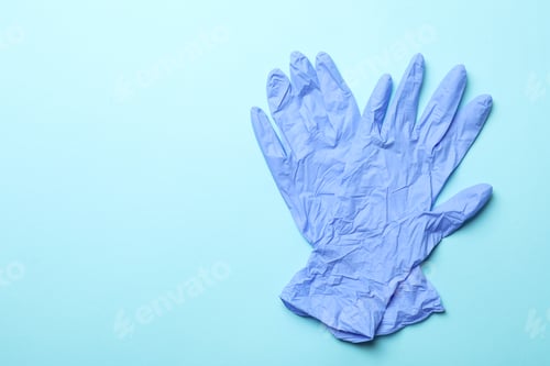Preview: Medical gloves on blue background, space for text