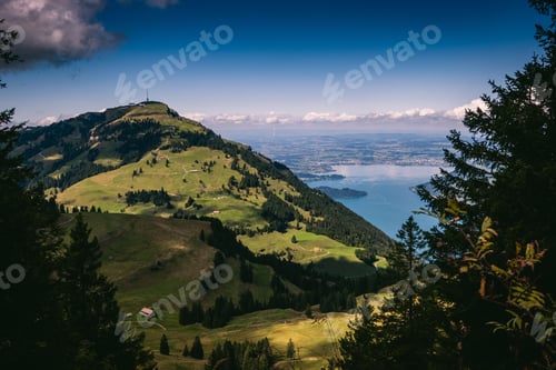 Preview: Scenic view from Rigi Scheidegg to the lake before a blue skyline in Switzerland