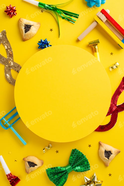 Preview: Purim festivity setup viewed from vertical top view. Highlights hamantaschen treats, masquerade gear