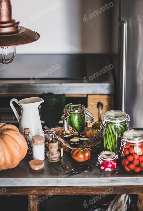 Preview: Ingredients and jars with homemade vegetables preserves