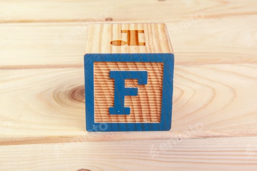 Preview: wooden block alphabet lay on wooden floor