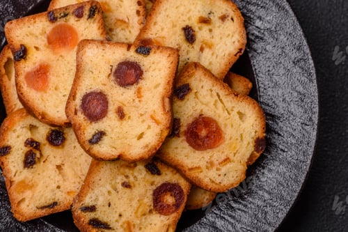 Preview: Fruit cake, a dessert with cherries, plums, and raisins for a festive Christmas table. Fruit cake