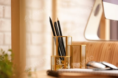 Preview: Gold accessories for interior design on table in room
