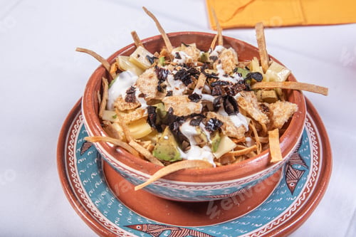 Preview: tortilla soup with chunks and tomato Mexican food