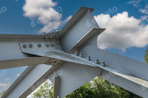 Preview: Bolts and nuts on metal plates of steel structure of heavy duty straight crossbar of frame