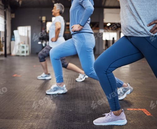 Preview: Stretching, fitness and women doing lunges in the gym for health, team yoga and workout in a class.