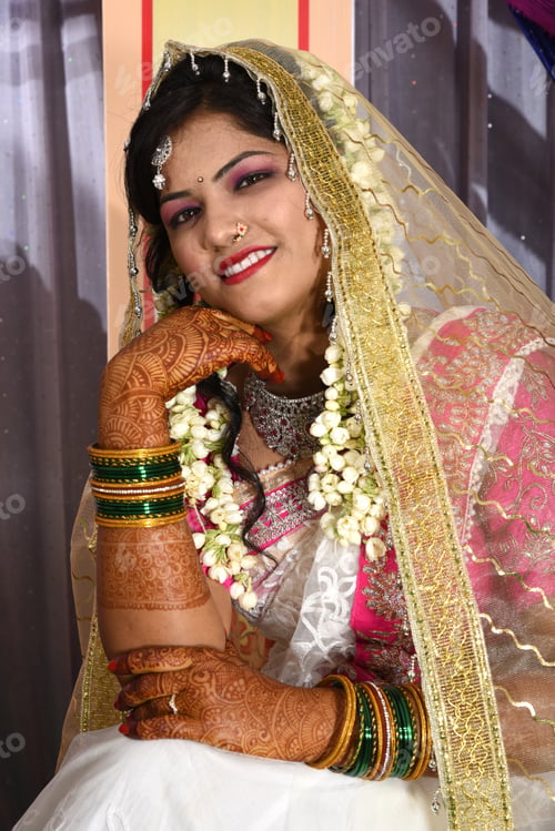 Preview: Indian bride wearing traditional wedding cloths in marriage ceremony.