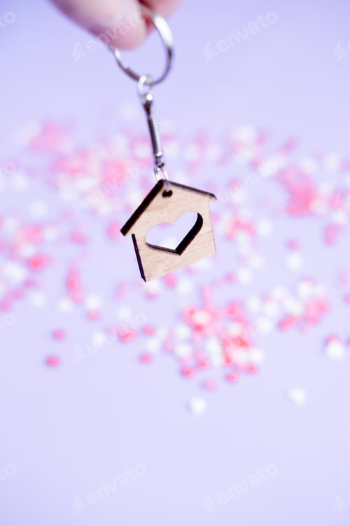 Preview: Valentine's day concept many small hearts and keychain on purple background