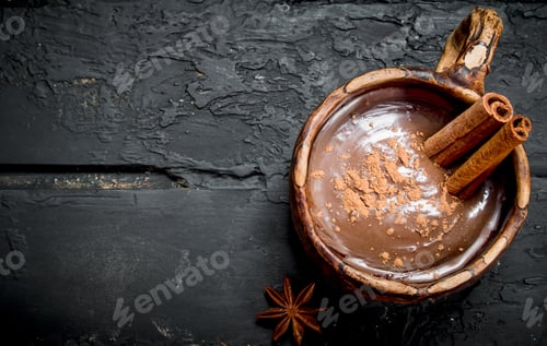 Preview: Hot chocolate with cinnamon sticks.