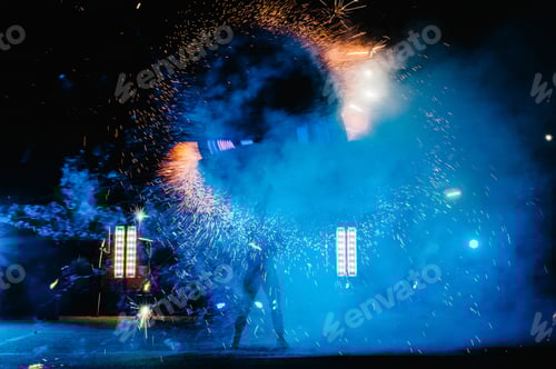 Preview: Fire show, dancing with flame, male master juggling with fireworks, performance outdoors, draws