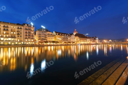 Preview: Beautiful historic city center of Lucerne with famous buildings and promanade during night..