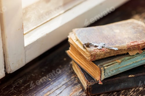 Preview: Old books on windowsill