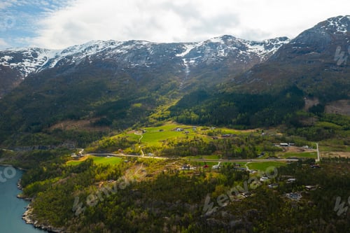 Preview: Hardanger Bridge spans vast body of fjord water between mountains