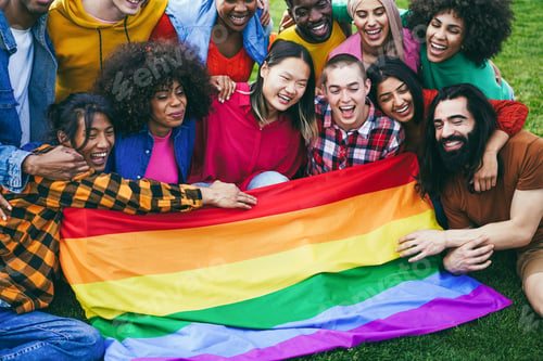 Preview: Diverse people having fun holding LGBT rainbow flag outdoor - Focus on bald girl face