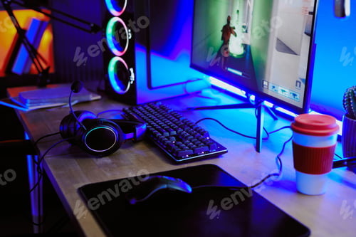 Preview: Teenager Live Streaming Video Game on Desktop Computer with Gaming Headset