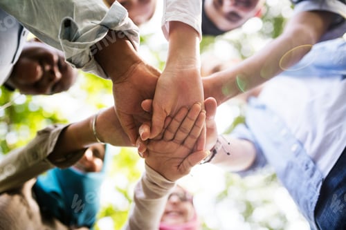 Preview: Group of diverse youth hands joined
