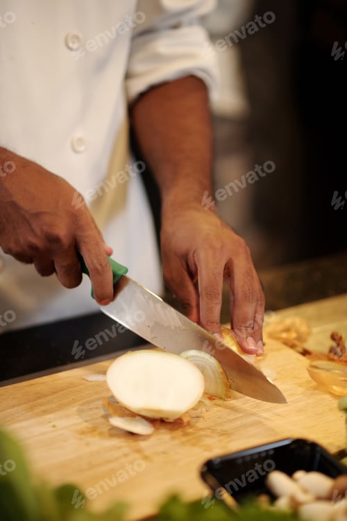 Preview: Cook Cutting Fresh Onion