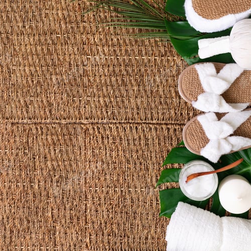 Preview: Skincare, beauty and spa concept with bath cosmetic accessories on rattan background. Flat lay. Top