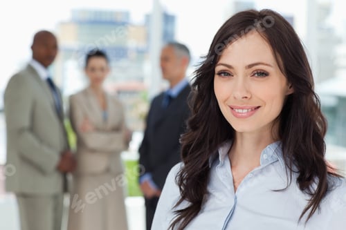 Preview: Executive Woman Showing A Beaming Smile In Front Of The Camera