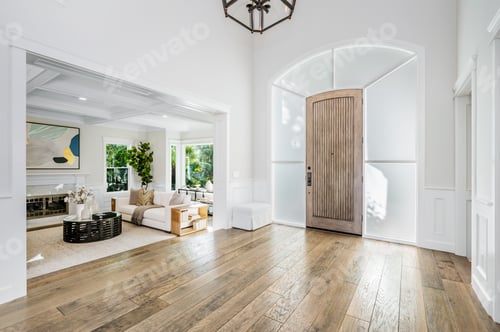 Preview: Elegant foyer with wooden floors and a grand entrance