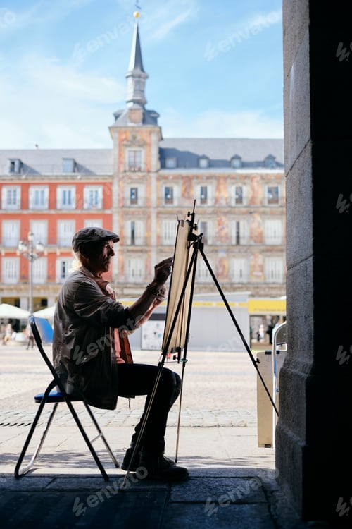 Preview: Senior Adult Working As Street Painter In Madrid