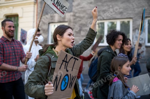 Preview: People with placards and posters on global strike for climate change, shouting.