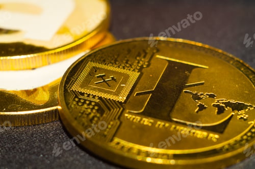 Preview: Vertical closeup shot of gold cryptocurrency illuminated with bright light