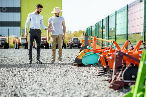Preview: Agronomist with salesman at the agricultural shop