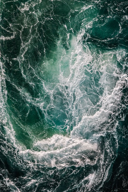 Preview: Blue waves of water of the river and the sea meet each other during high tide and low tide.