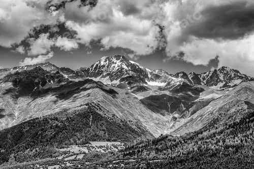 Preview: Landscape with snow-capped mountains under a cloudy sky, Svaneti, Georgia.