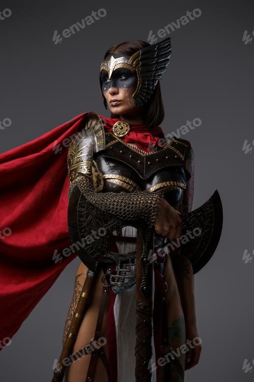 Preview: Ancient woman barbarian dressed in red cloak holding axe