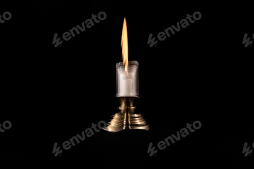 Preview: Double exposure of a candle in the dark