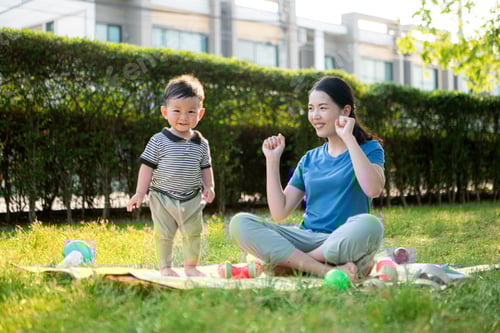 Preview: While in vacation at home, a mother engages in activities with little kid in the park