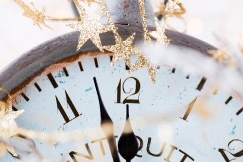 Preview: Abstract background with fireworks and clock close to midnight.