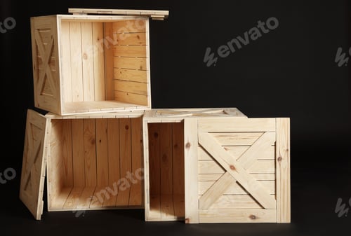 Preview: Group of wooden crates on black background