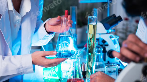 Preview: A group of young scientists are conducting experiments in the lab using a microscope.