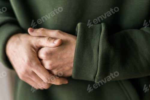 Preview: Close up of detail sweatshirt or hoodie - fabric and tailoring clothes design concept