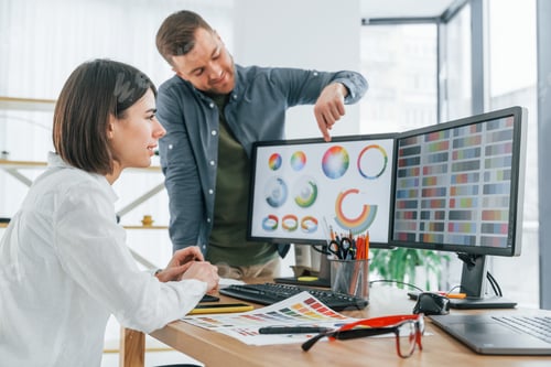 Preview: Talking and creating content. Two designers working together in the office